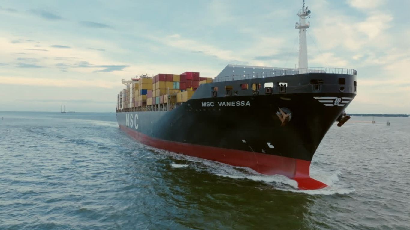 Container vessel underway at sea, carrying import cargo bound for Korea